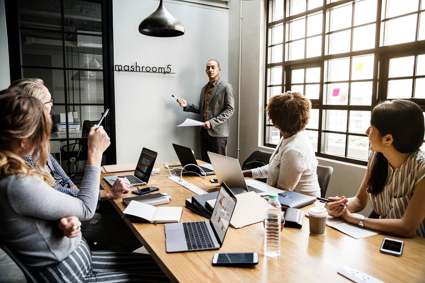 BuddyBoss Custom Development group diverse people having business meeting - BuddyBoss Custom Development